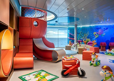 Colorful kids' play area onboard with slides, toys, and ocean views | MSC Cruises Colorful kids' play area onboard with slides, toys, and ocean views | MSC Cruises